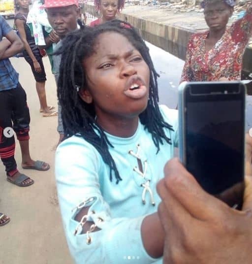 Lady caught trying to throw away her baby in Lagos (photos)