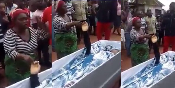 Lady accused of killing her neighbor, forced to swear with her corpse in Abia State (video)