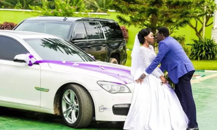 More photos of Mike Bamiloye’s son, Joshua and his wife with Pastor Adeboye at his wedding