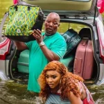 Disaster Holiday (2024) wp-17341633157528751152930814651301.jpg